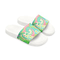 White slides with colorful paisley pattern on a white background
