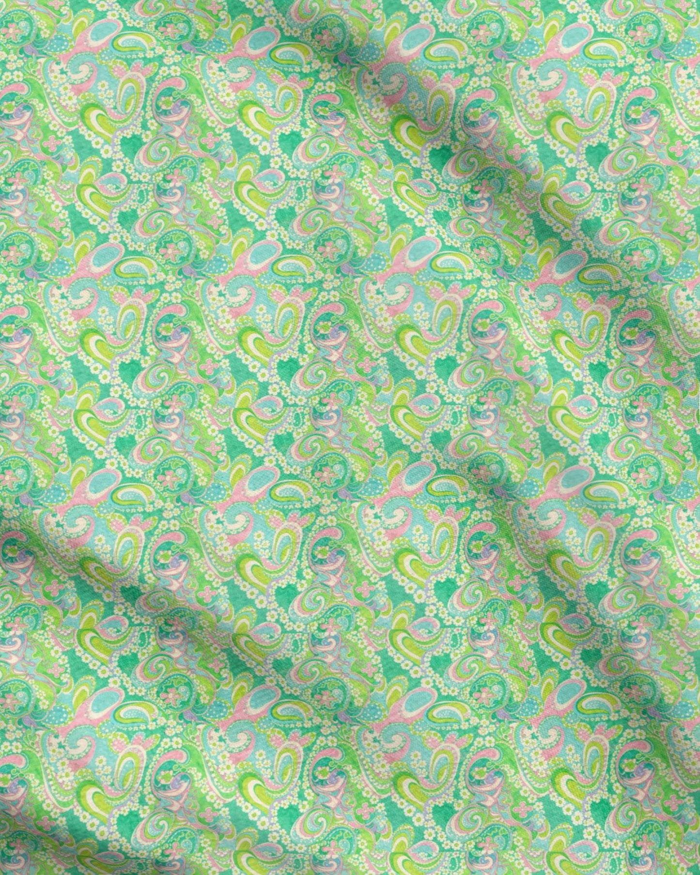 Patterned fabric with green and pink tones