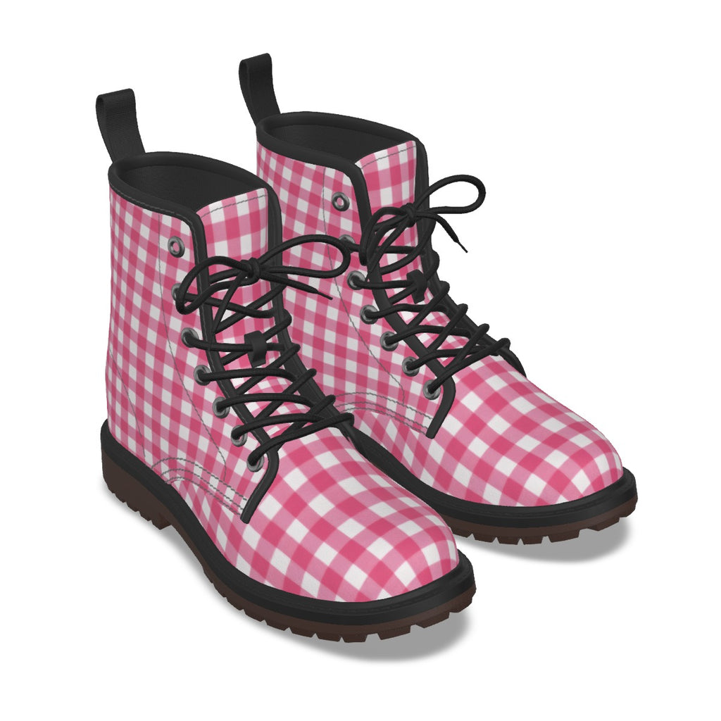 A pair of pink and white gingham checkered lace-up ankle boots with black laces, black collar lining, and dark brown soles, shown on a white background.