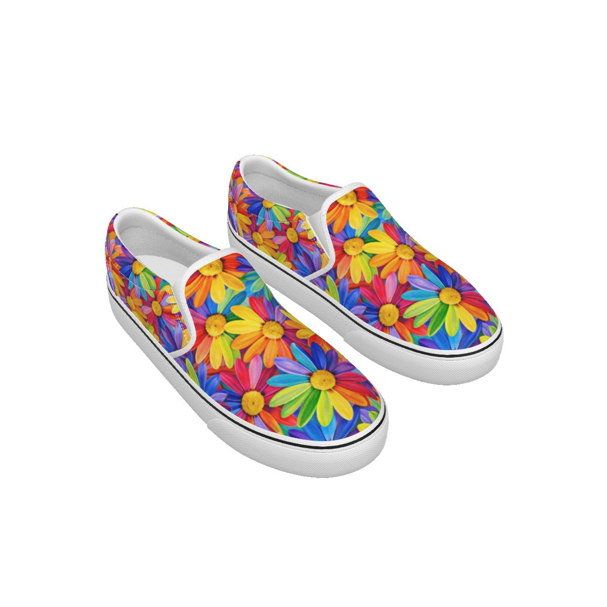 A pair of slip-on canvas sneakers with a vibrant, multicolored daisy floral print on a clean white background.