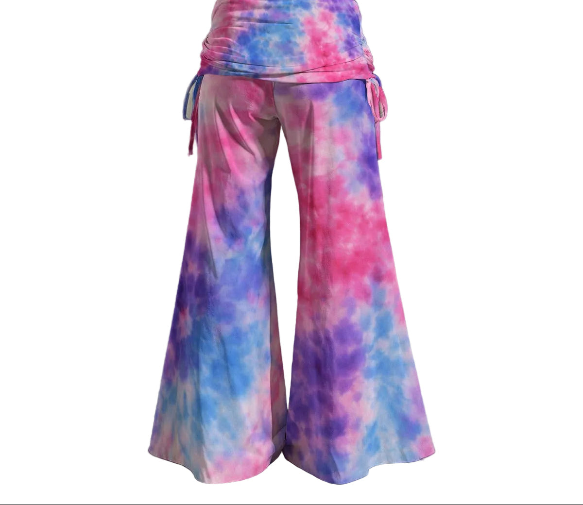 Tie-dye pants worn by a person on a gray background