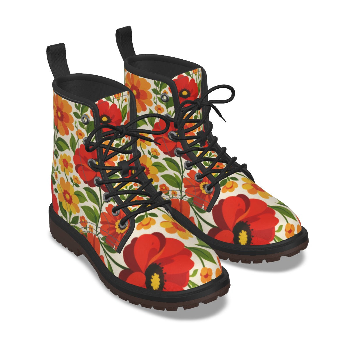 A pair of lace-up ankle boots with a vibrant floral print featuring red poppies, yellow flowers, and green leaves on a cream background, with black laces and black soles.