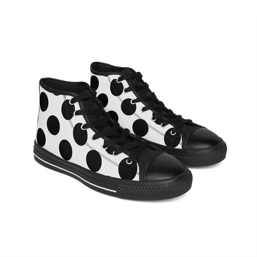 Black and white polka dot high-top sneakers on a white background